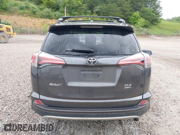 2016 Toyota RAV4 XLE with VIN 2T3RFREV4GW494108, listed as a IAAI auction lot 42234227 with 102,216 mi miles and . Bid and sale history available at DreamBid. Image 16.