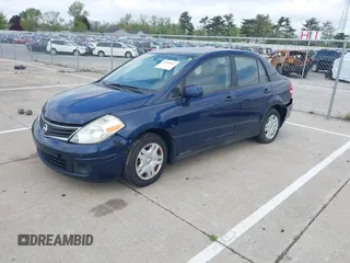 2011 Nissan Versa S with VIN 3N1BC1AP6BL413146, listed as a IAAI auction lot 42199267 with Not provided miles and . Bid and sale history available at DreamBid. Image 2.