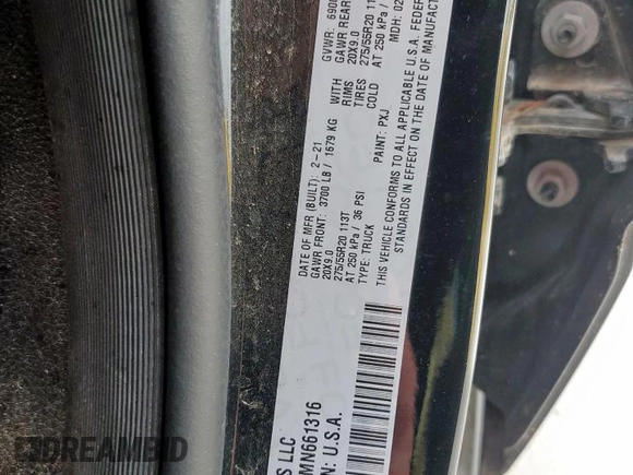 2021 Ram 1500 Lone Star with VIN 1C6RREFT4MN661316, listed as a Copart auction lot 61218605 with 61,672 mi miles and Salvage title. Bid and sale history available at DreamBid. Image 12.