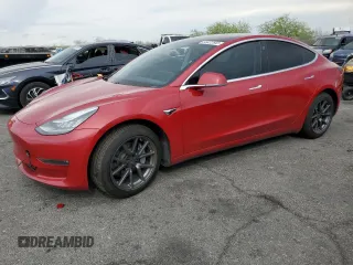 2018 Tesla Model 3 Long Range Battery z VIN 5YJ3E1EB0JF084967, wystawiony jako Copart lot #58422565 z przebiegiem Nie podano mil oraz Szkoda całkowita • Salvage title. Historia ofert i sprzedaży dostępna na DreamBid. Obrazek 1.