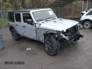 2022 Jeep Wrangler Unlimited Willys Sport with VIN 1C4HJXDM9NW272685, listed as a IAAI auction lot 41948921 with Not provided miles and . Bid and sale history available at DreamBid. Image 1.