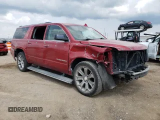 2015 Chevrolet Suburban LTZ with VIN 1GNSKKKC6FR556105, listed as a Copart auction lot 64034304 with 106,269 mi miles and Salvage Title. Bid and sale history available at DreamBid. Image 4.