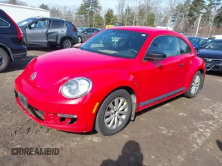 2013 Volkswagen Beetle Entry with VIN 3VWFP7AT8DM624961, listed as a IAAI auction lot 41772386 with 154,597 mi miles and . Bid and sale history available at DreamBid. Image 17.