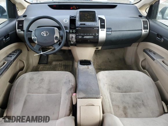 2005 Toyota Prius z VIN JTDKB20U153026520, wystawiony jako Copart lot #50978655 z przebiegiem 237 511 mil mil oraz Szkoda całkowita • Salvage title. Historia ofert i sprzedaży dostępna na DreamBid. Obrazek 8.