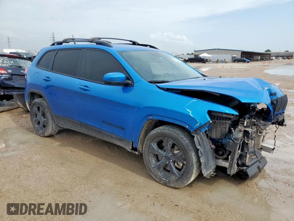 2021 Jeep Cherokee Altitude with VIN 1C4PJLLB0MD215189, listed as a Copart auction lot 61094535 with 88,449 mi miles and Salvage title. Bid and sale history available at DreamBid. Image 4.