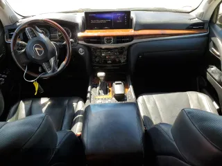2018 Lexus LX with VIN JTJHY7AX0J4254556, listed as a Copart auction lot 64710904 with 76,701 mi miles and Salvage Title. Bid and sale history available at carsss.com. Image 8.