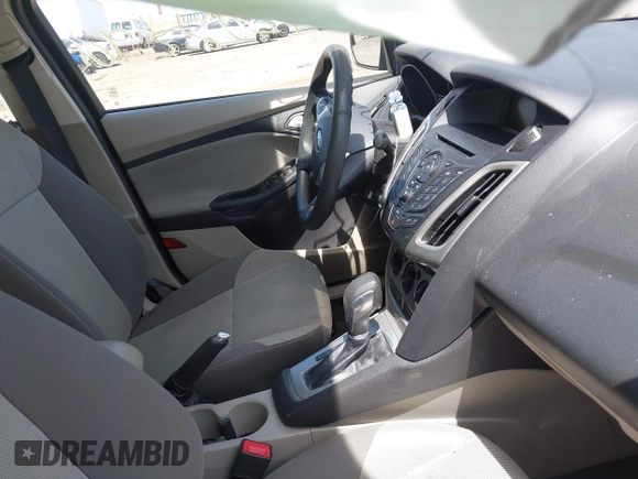 2014 Ford Focus SE with VIN 1FADP3F2XEL120830, listed as a IAAI auction lot 42082905 with 19,128 mi miles and . Bid and sale history available at DreamBid. Image 5.