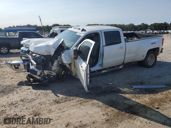 2018 Chevrolet Silverado 3500HD Work Truck with VIN 1GC4KZCG8JF218517, listed as a Copart auction lot 74915614 with 148,040 mi miles and Salvage Title. Bid and sale history available at carsss.com. Image 1.