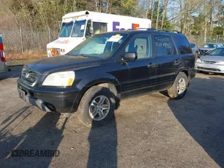 2004 Honda Pilot EX with VIN 5FNYF18484B001905, listed as a IAAI auction lot 42224000 with 254,787 mi miles and . Bid and sale history available at carsss.com. Image 2.