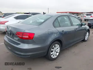 2015 Volkswagen Jetta Sedan 1.8T SE with VIN 3VWD17AJ9FM286917, listed as a IAAI auction lot 41904565 with 166,841 mi miles. Bid and sale history available at carsss.com. Image 4.