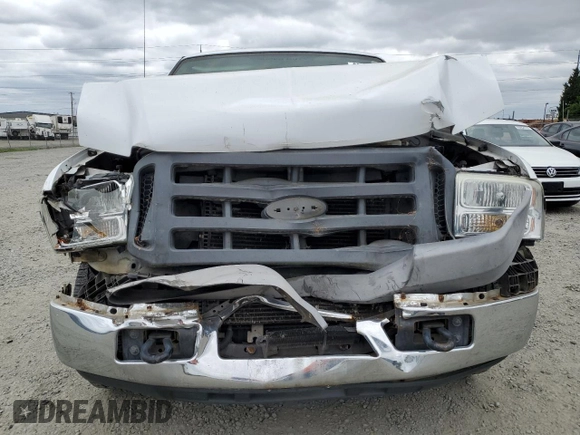 2005 Ford F-250 XL with VIN 1FTNF20595EB89821, listed as a Copart auction lot 60841825 with 133,523 mi miles and Salvage title. Bid and sale history available at DreamBid. Image 5.
