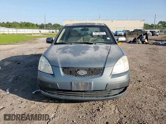 2007 Kia Rio LX with VIN KNADE123X76253489, listed as a Copart auction lot 52176475 with 148,154 mi miles and Salvage Title. Bid and sale history available at carsss.com. Image 10.