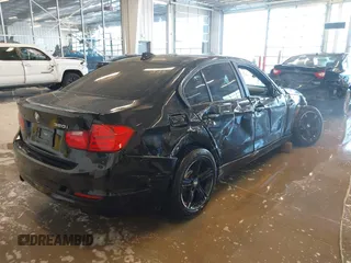 2015 BMW 3 Series 320i xDrive with VIN WBA3C3C56FK203031, listed as a IAAI auction lot 41012182 with 83,611 mi miles and . Bid and sale history available at DreamBid. Image 4.