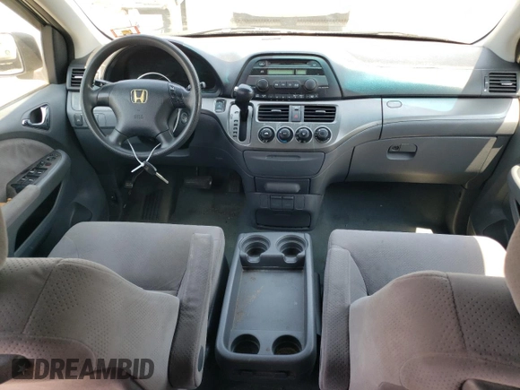 2007 Honda Odyssey LX with VIN 5FNRL38287B054504, listed as a Copart auction lot 59141665 with 128,617 mi miles and Salvage title. Bid and sale history available at DreamBid. Image 8.