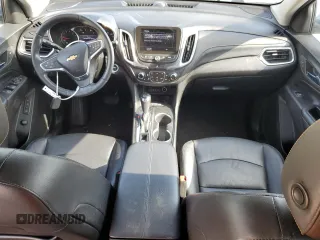 2019 Chevrolet Equinox Premier z VIN 2GNAXNEV5K6302984, wystawiony jako Copart lot #56033935 z przebiegiem 59 554 mil mil oraz Szkoda całkowita • Salvage title. Historia ofert i sprzedaży dostępna na DreamBid. Obrazek 8.