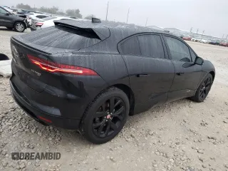 2020 Jaguar I-Pace HSE z VIN SADHD2S19L1F85837, wystawiony jako Copart lot #82815084 z przebiegiem 56 076 mil mil oraz Szkoda całkowita • Salvage title. Historia ofert i sprzedaży dostępna na DreamBid. Obrazek 3.