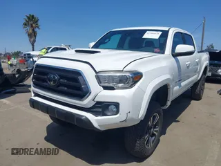 2021 Toyota Tacoma 4WD SR5 with VIN 3TMDZ5BN4MM106693, listed as a IAAI auction lot 41986838 with 52,510 mi miles. Bid and sale history available at carsss.com. Image 21.