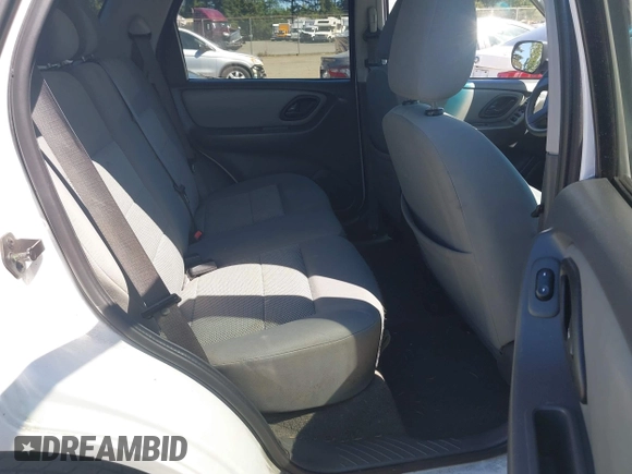2007 Ford Escape XLT with VIN 1FMYU03127KC05177, listed as a IAAI auction lot 42199281 with 144,846 mi miles and . Bid and sale history available at DreamBid. Image 8.
