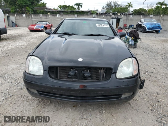2000 Mercedes-Benz SLK 230 Kompressor with VIN WDBKK47F0YF149827, listed as a Copart auction lot 62524515 with 62,005 mi miles and Salvage title. Bid and sale history available at DreamBid. Image 5.