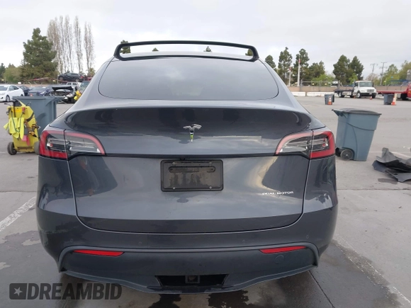 2021 Tesla Model Y Long Range with VIN 5YJYGAEE0MF223140, listed as a IAAI auction lot 42007701 with 55,308 mi miles. Bid and sale history available at carsss.com. Image 17.