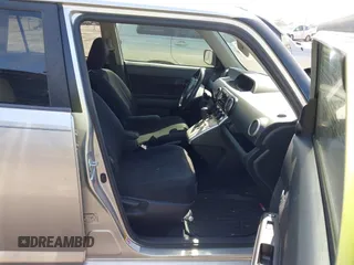 2009 Scion xB with VIN JTLKE50E591067272, listed as a IAAI auction lot 41674440 with 170,116 mi miles. Bid and sale history available at carsss.com. Image 5.
