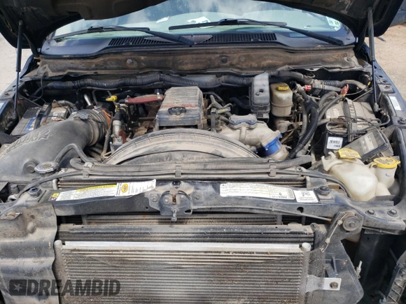 2009 Dodge 3500 SLT z VIN 3D7MX48L69G536565, wystawiony jako Copart lot #51848415 z przebiegiem 232 073 mil mil oraz Szkoda całkowita • Salvage title. Historia ofert i sprzedaży dostępna na DreamBid. Obrazek 11.
