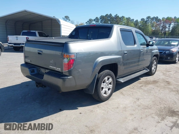 2007 Honda Ridgeline RTL z VIN 2HJYK16557H531198, wystawiony jako IAAI lot #41998612 z przebiegiem 194 975 mil mil oraz . Historia ofert i sprzedaży dostępna na DreamBid. Obrazek 4.