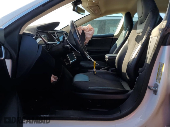 2013 Tesla Model S z VIN 5YJSA1CN1DFP11636, wystawiony jako Copart lot #78333554 z przebiegiem 101 625 mil mil oraz Szkoda całkowita • Salvage title. Historia ofert i sprzedaży dostępna na DreamBid. Obrazek 7.