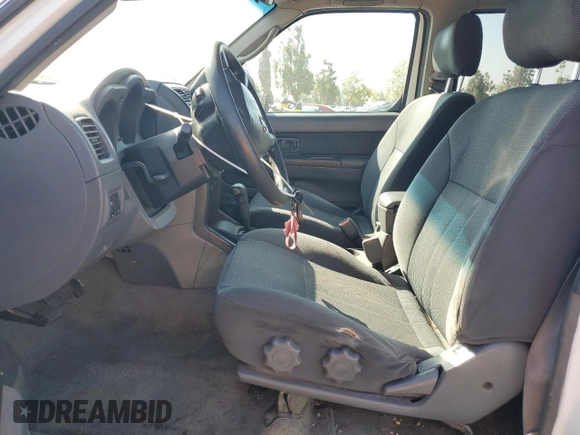 2004 Nissan Frontier XE with VIN 1N6ED29X94C423389, listed as a Copart auction lot 57357255 with 195,700 mi miles and Salvage title. Bid and sale history available at DreamBid. Image 7.