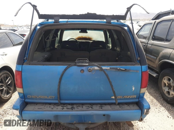 1995 Chevrolet Blazer с VIN 1GNDT13W8S2197190, выставлен на аукционе Copart как лот 52053765 с пробегом Не указан миль и На запчасти • Non repairable. История ставок и продаж доступна на DreamBid. Изображение 6.