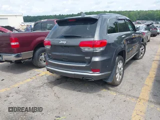 2020 Jeep Grand Cherokee Summit with VIN 1C4RJFJT0LC137054, listed as a IAAI auction lot 42235704 with 70,000 mi miles and . Bid and sale history available at DreamBid. Image 4.