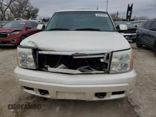 2002 Cadillac Escalade z VIN 1GYEK63N82R235118, wystawiony jako Copart lot #82691054 z przebiegiem 196 955 mil mil oraz Szkoda całkowita • Salvage title. Historia ofert i sprzedaży dostępna na DreamBid. Obrazek 5.