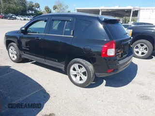 2013 Jeep Compass Sport with VIN 1C4NJDBB1DD217533, listed as a IAAI auction lot 41461759 with 205,972 mi miles. Bid and sale history available at carsss.com. Image 3.