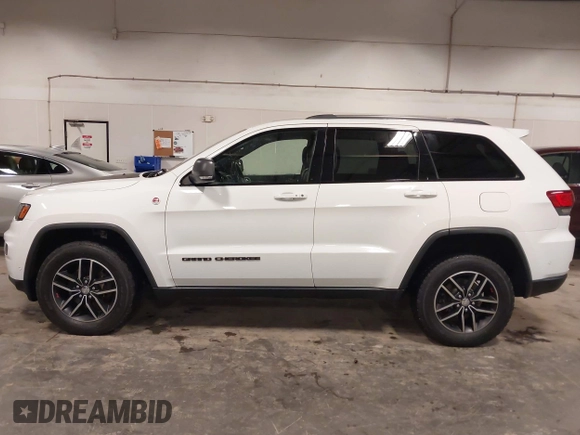 2017 Jeep Grand Cherokee Trailhawk with VIN 1C4RJFLG7HC712208, listed as a IAAI auction lot 42174543 with 158,518 mi miles and . Bid and sale history available at DreamBid. Image 14.