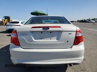 2012 Ford Fusion SE with VIN 3FAHP0HA5CR365828, listed as a Copart auction lot 61581295 with 142,207 mi miles and Salvage title. Bid and sale history available at DreamBid. Image 6.