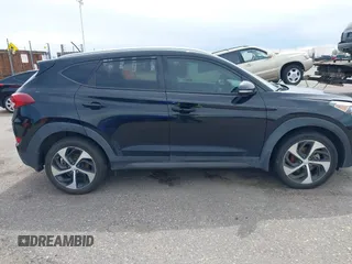 2016 Hyundai Tucson Limited with VIN KM8J33A27GU181240, listed as a IAAI auction lot 42183028 with 104,557 mi miles. Bid and sale history available at carsss.com. Image 13.