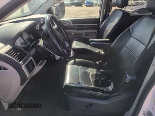 2010 Dodge Grand Caravan SXT with VIN 2D4RN5D16AR444938, listed as a Copart auction lot 56762695 with 251,437 mi miles and Clean Title. Bid and sale history available at DreamBid. Image 7.