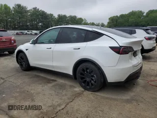2022 Tesla Model Y Long Range z VIN 7SAYGDEE5NA016276, wystawiony jako Copart lot #55942355 z przebiegiem 14 085 mil mil oraz Szkody całkowita. Historia ofert i sprzedaży dostępna na DreamBid. Obrazek 2.