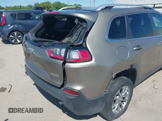 2019 Jeep Cherokee Latitude Plus with VIN 1C4PJMLBXKD233749, listed as a IAAI auction lot 41937698 with 103,988 mi miles and . Bid and sale history available at DreamBid. Image 6.