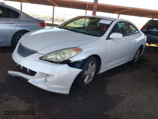 2004 Toyota Camry Solara SE with VIN 4T1CA38P54U005203, listed as a IAAI auction lot 41878752 with 194,959 mi miles. Bid and sale history available at carsss.com. Image 2.