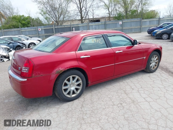 2007 Chrysler 300 C with VIN 2C3KA63H57H684368, listed as a IAAI auction lot 42144972 with 117,478 mi miles. Bid and sale history available at carsss.com. Image 4.