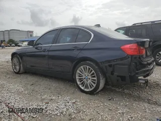 2012 BMW 3 Series 328i with VIN WBA3A5G51CNP17682, listed as a Copart auction lot 59619485 with 100,936 mi miles and Salvage title. Bid and sale history available at DreamBid. Image 2.