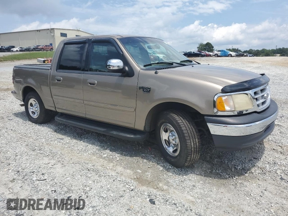 2001 Ford F-150 XLT z VIN 1FTRW07L81KF68346, wystawiony jako Copart lot #57460445 z przebiegiem Nie podano mil oraz Szkoda całkowita • Salvage title. Historia ofert i sprzedaży dostępna na DreamBid. Obrazek 4.