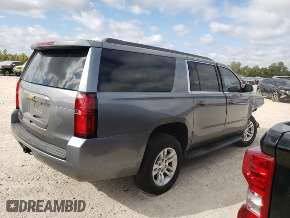 2020 Chevrolet Suburban LS z VIN 1GNSCGKC0LR178627, wystawiony jako Copart lot #75691803 z przebiegiem 60 978 mil mil oraz Szkoda całkowita • Salvage title. Historia ofert i sprzedaży dostępna na DreamBid. Obrazek 3.