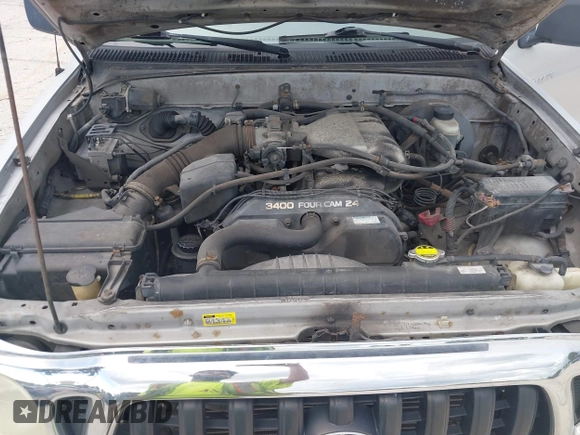 2004 Toyota Tacoma PreRunner z VIN 5TEGN92N74Z411950, wystawiony jako IAAI lot #42536808 z przebiegiem 201 453 mil mil oraz . Historia ofert i sprzedaży dostępna na DreamBid. Obrazek 10.
