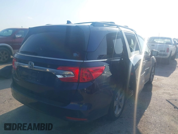 2019 Honda Odyssey EX-L with VIN 5FNRL6H75KB054465, listed as a IAAI auction lot 41841488 with 141,790 mi miles. Bid and sale history available at carsss.com. Image 4.