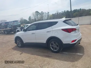 2017 Hyundai Santa Fe 2.4L z VIN 5NMZU3LB4HH026378, wystawiony jako IAAI lot #41906997 z przebiegiem 105 777 mil mil oraz . Historia ofert i sprzedaży dostępna na DreamBid. Obrazek 14.