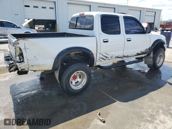 2002 Toyota Tacoma PreRunner with VIN 5TEGN92N02Z887650, listed as a Copart auction lot 49416255 with 290,615 mi miles and Salvage Title. Bid and sale history available at DreamBid. Image 3.
