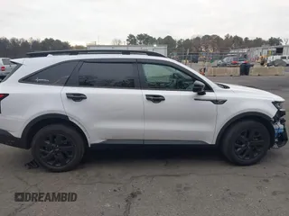 2022 Kia Sorento X-Line S with VIN 5XYRLDLC5NG072566, listed as a IAAI auction lot 41297519 with 52,365 mi miles. Bid and sale history available at carsss.com. Image 13.