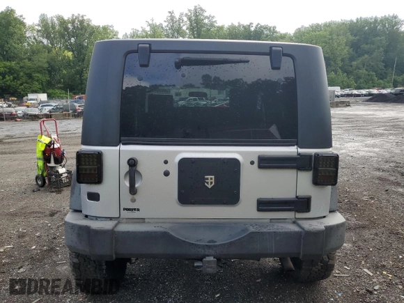 2007 Jeep Wrangler X with VIN 1J4FA24117L202404, listed as a Copart auction lot 58690485 with 126,347 mi miles and Salvage title. Bid and sale history available at DreamBid. Image 6.